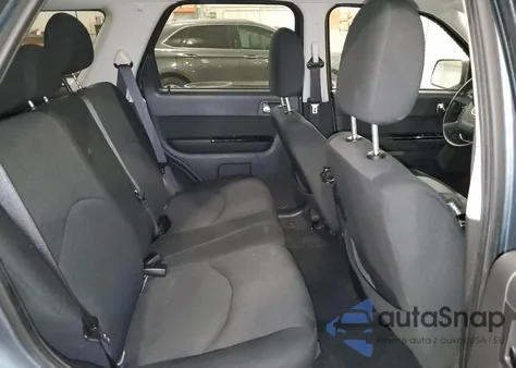 2010 Mazda Tribute I z USA, uszkodzony, nr VIN 4F2CY0C76AKM06448